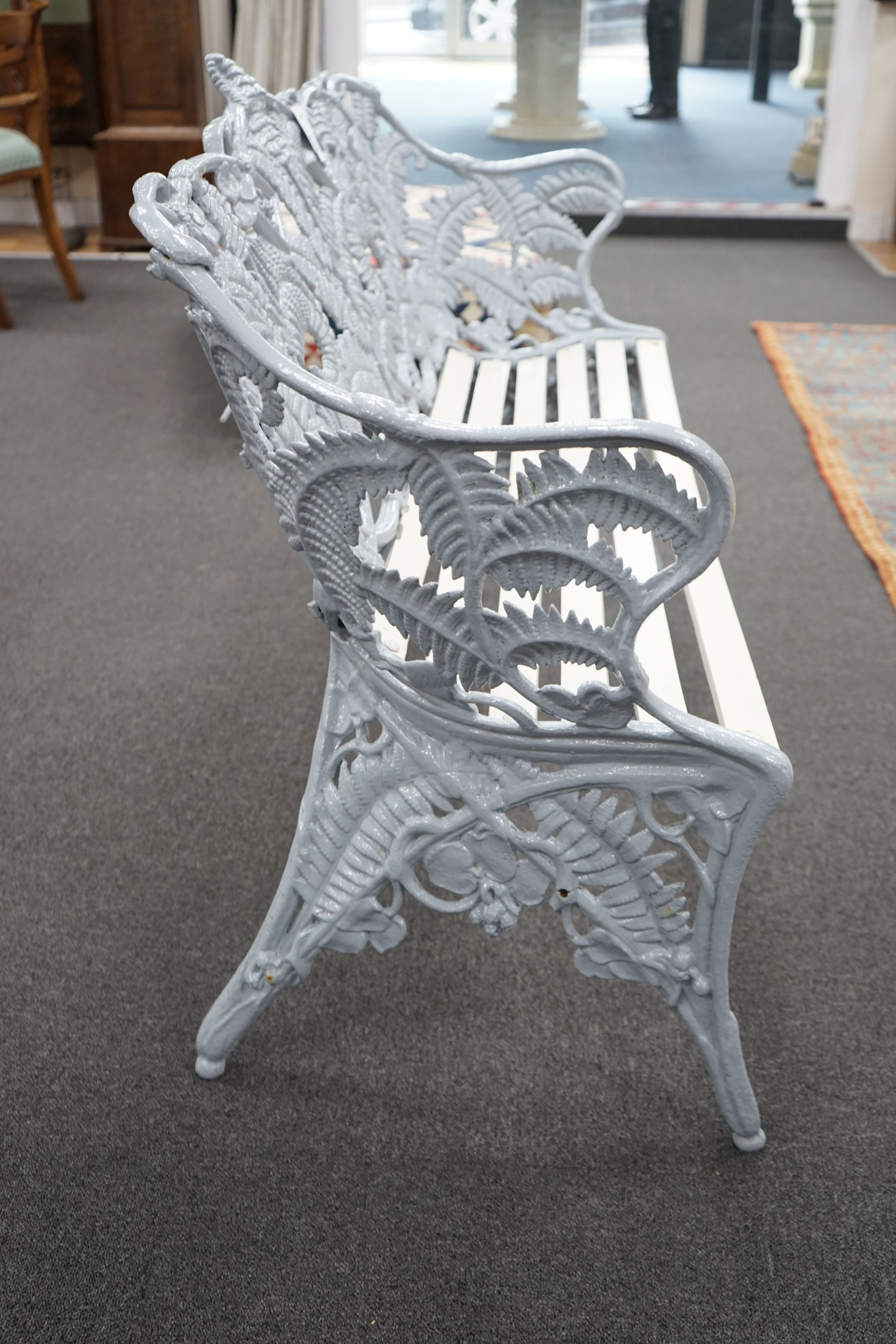 A Victorian Coalbrookdale cast iron Fern pattern garden bench, repainted and with a re-slatted wood seat, length 152cm, depth 56cm, height 94cm